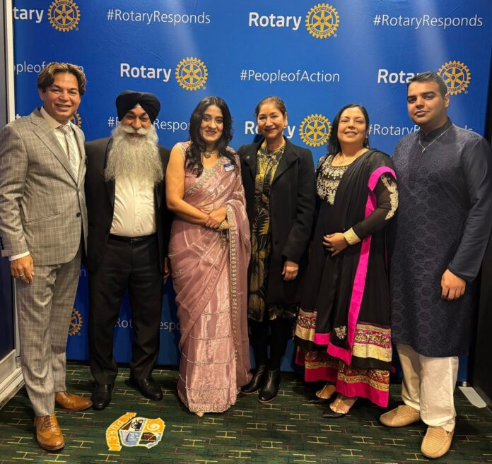 Kharag Singh, second from left, with others at a Rotary event.