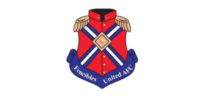 The Fencibles United AFC club crest, a red military tunic with gold epaulettes and blue and white cross-belts, above a blue scroll bearing the club name.