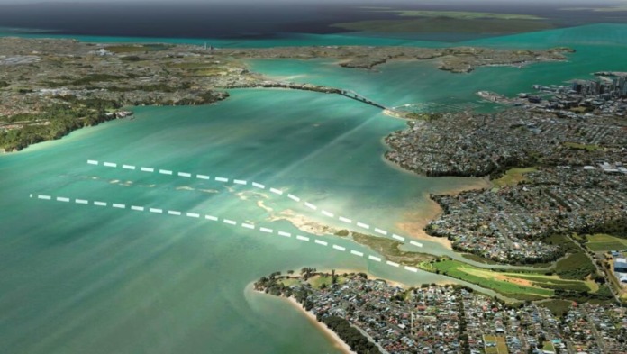An aerial visualisation of the Waitemata Harbour with two dashed lines marking a proposed crossing at Meola Reef, and the Auckland Harbour Bridge in the background.